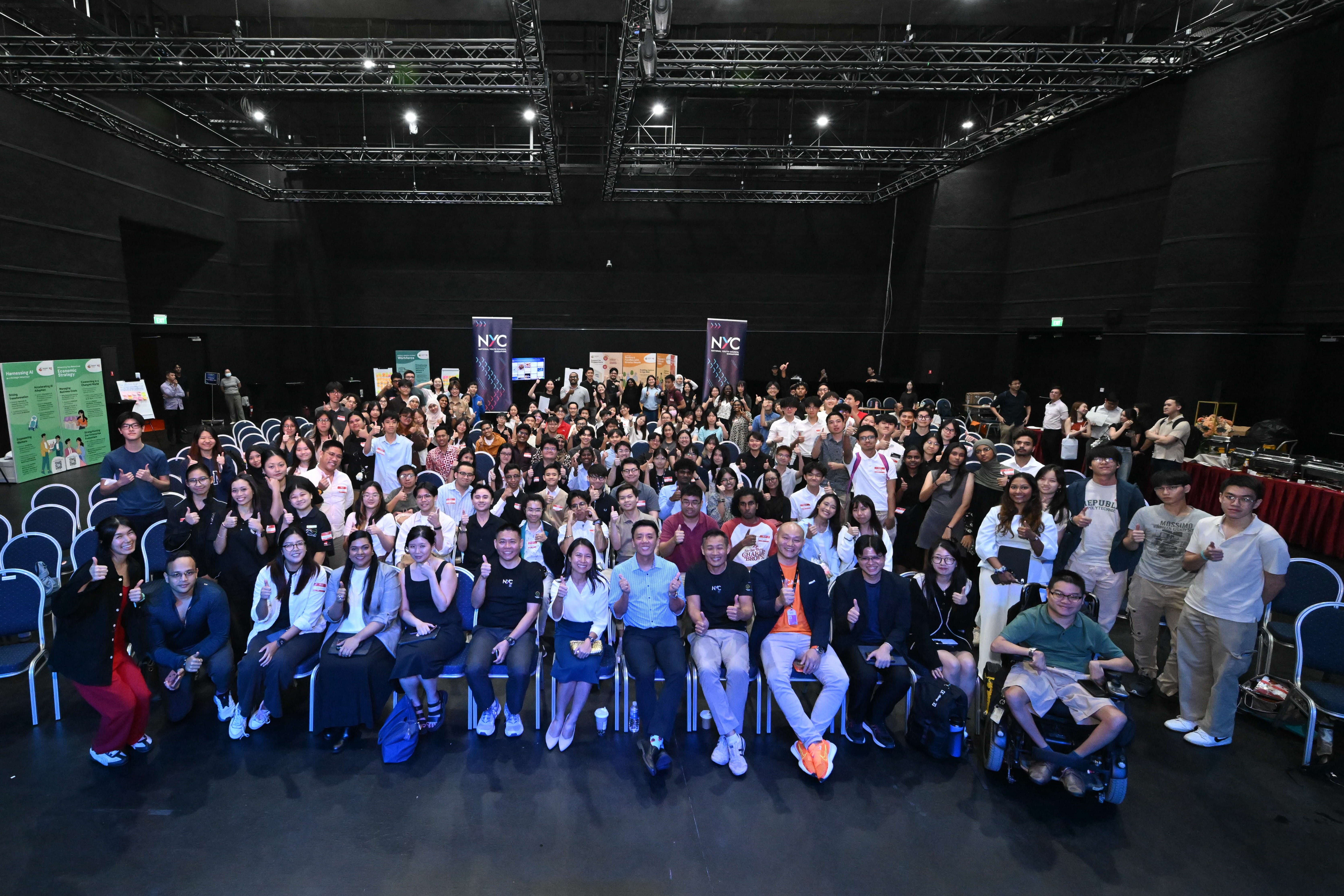 Large group of youths and ministers posing at post budget event